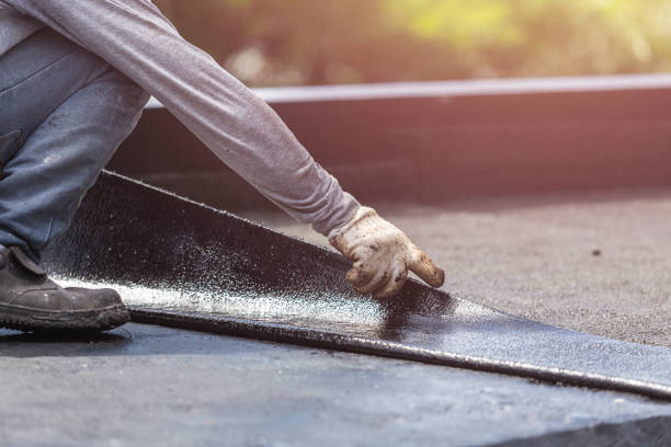 Professional Basement Waterproofing technician working in Tyner, IN